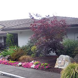 The Tacoma Country and Golf Club marker in its beautiful setting near the club house.