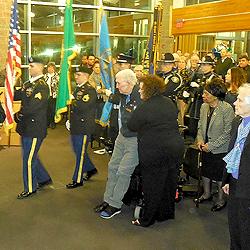 Society Director Emeritus (and first mayor of the City of Lakewood) Bill Harrison is among those standing for the entrance of the color guard.